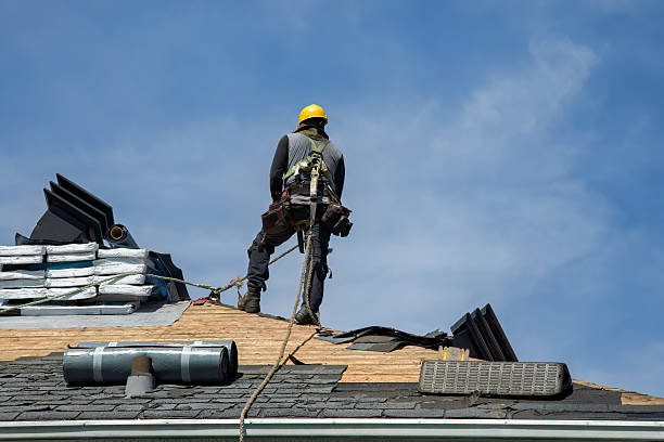 Professional Gutter Installation technician working in Bay City, OR